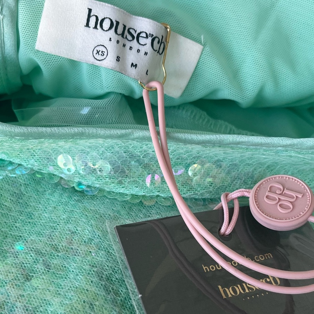 House of CB  Tatania
Seafoam Sequin Maxi Gown
USD $329 - Picture 8 of 16